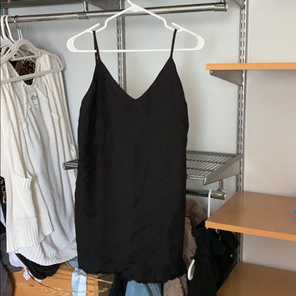 simple black dress with lightly raw hem